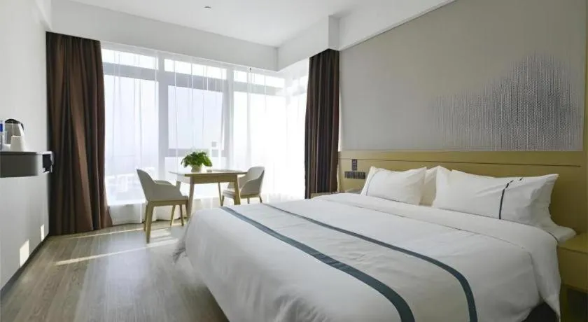 Bed in City Comfort Inn Dangtu High Speed East Railway Station RT-Mart