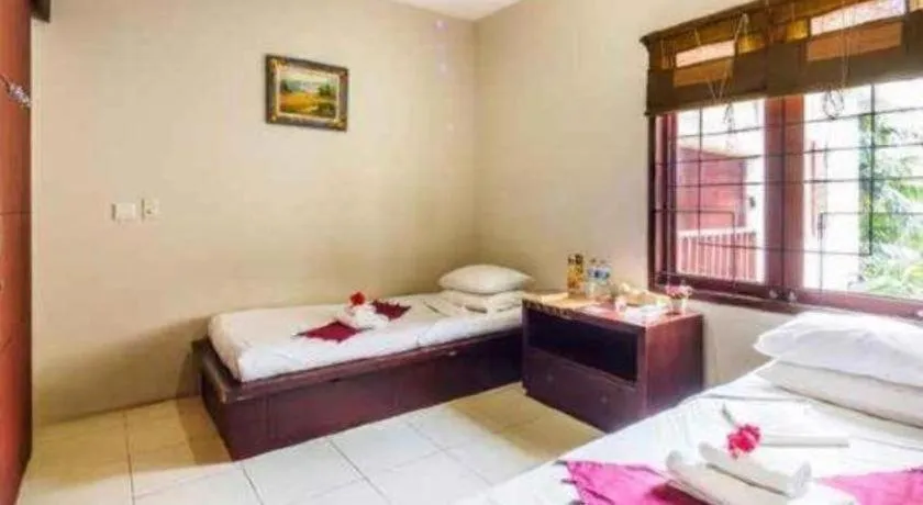 Bed in Al-Isha Dharamshala