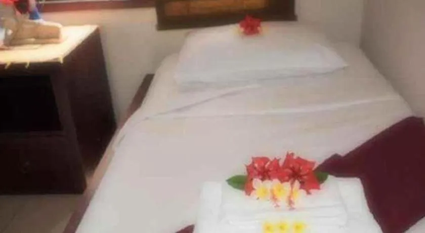 Bed in Al-Isha Dharamshala