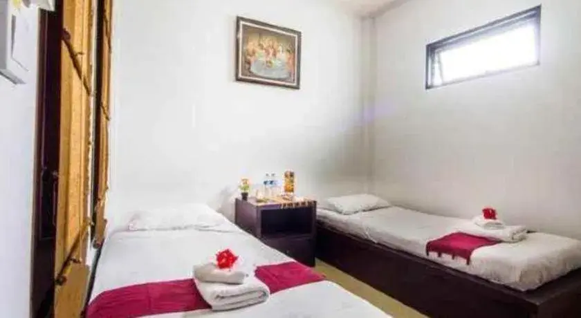 Bed in Al-Isha Dharamshala Bed in Al-Isha Dharamshala