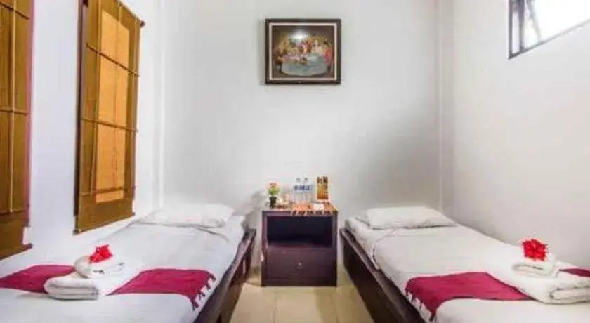 Bed in Al-Isha Dharamshala Bed in Al-Isha Dharamshala