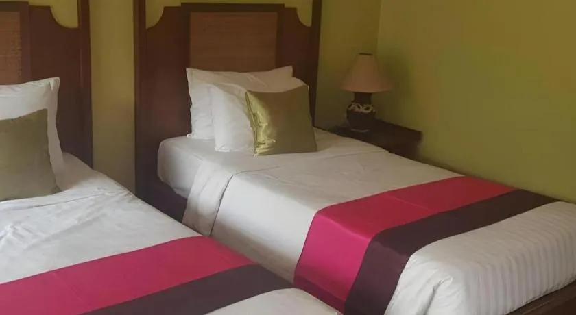 Bed in Phuphaya Resort Pattaya