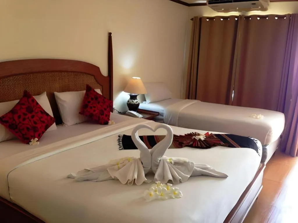 Bed in Phuphaya Resort Pattaya