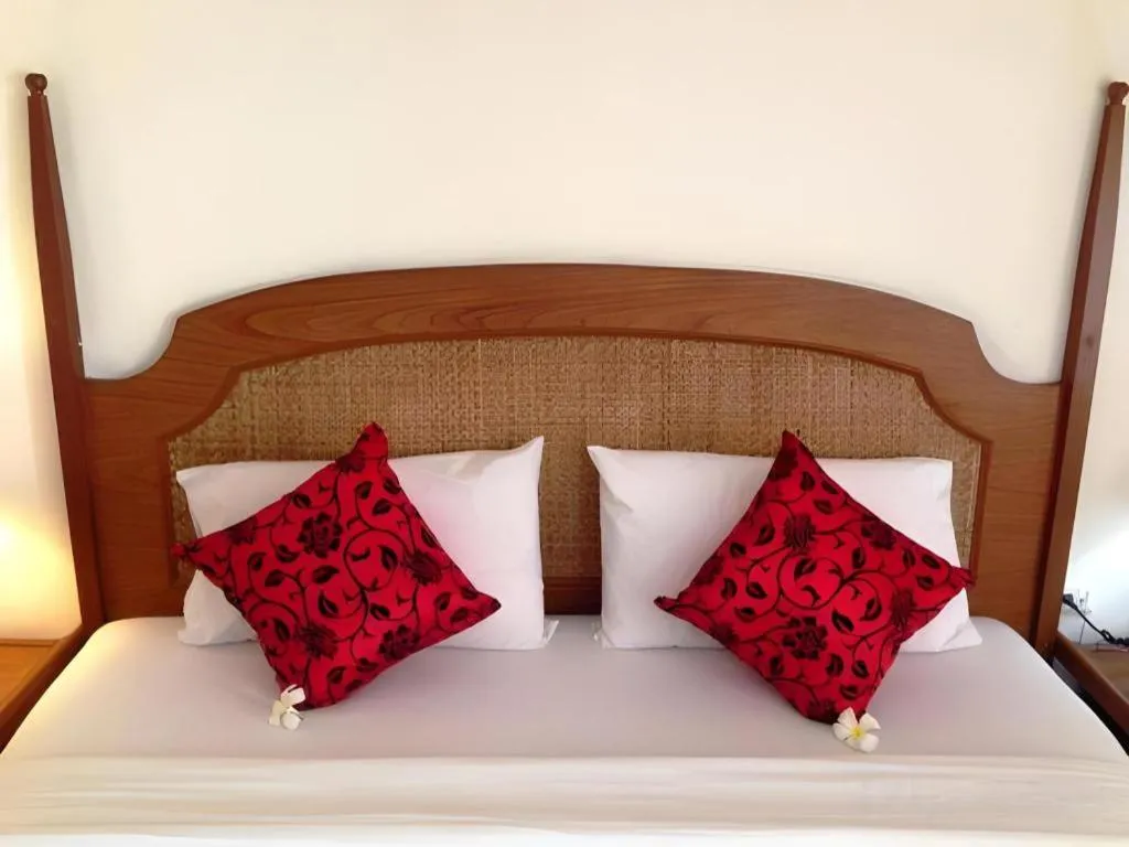 Bed in Phuphaya Resort Pattaya