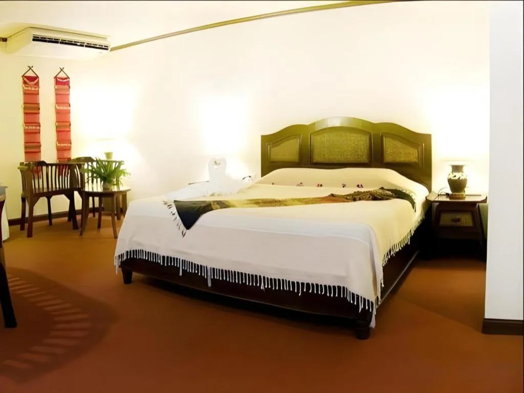 Bed in Phuphaya Resort Pattaya