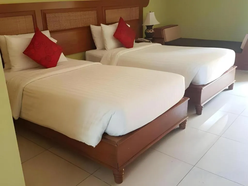 Bed in Phuphaya Resort Pattaya