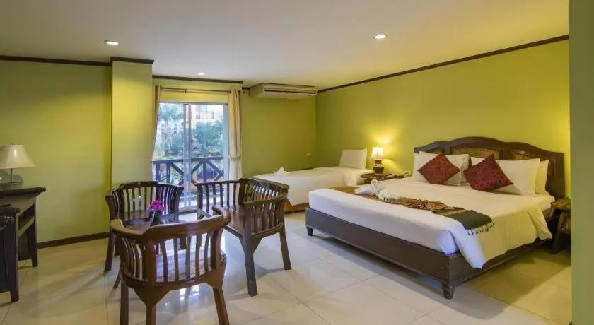 Bed in Phuphaya Resort Pattaya