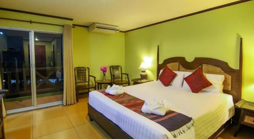 Bed in Phuphaya Resort Pattaya