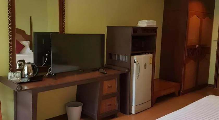 Bed in Phuphaya Resort Pattaya