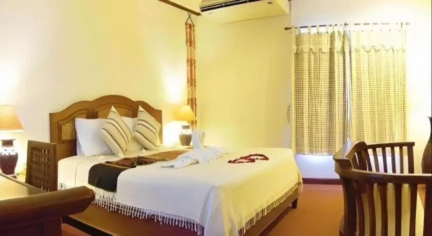 Bed in Phuphaya Resort Pattaya