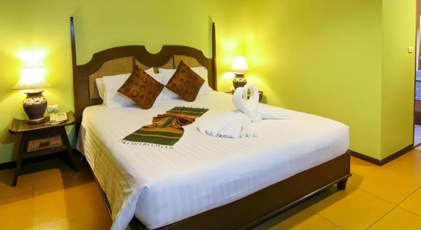 Bed in Phuphaya Resort Pattaya