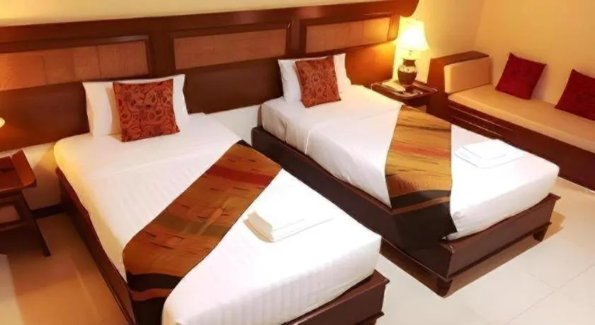 Bed in Phuphaya Resort Pattaya