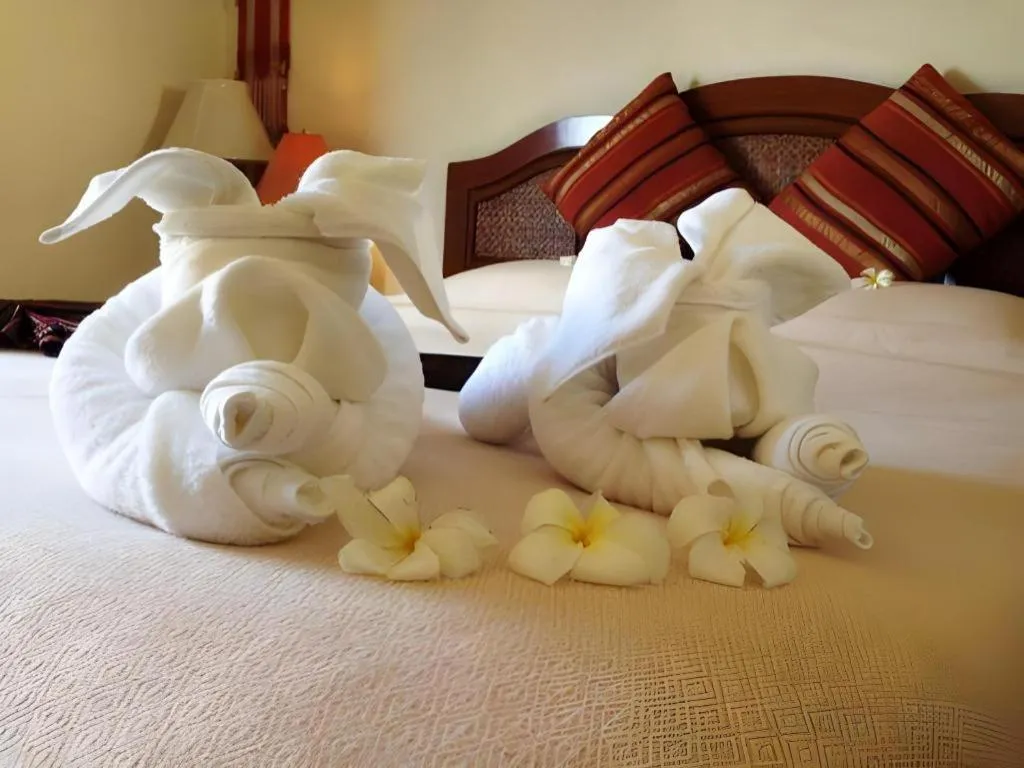 Bed in Phuphaya Resort Pattaya