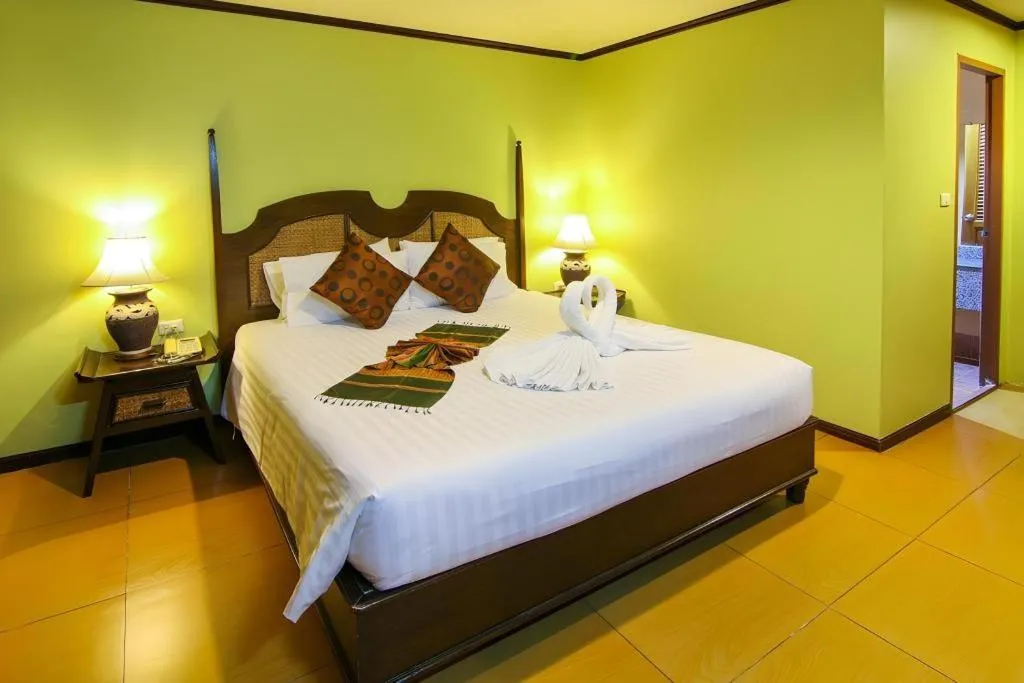 Bed in Phuphaya Resort Pattaya