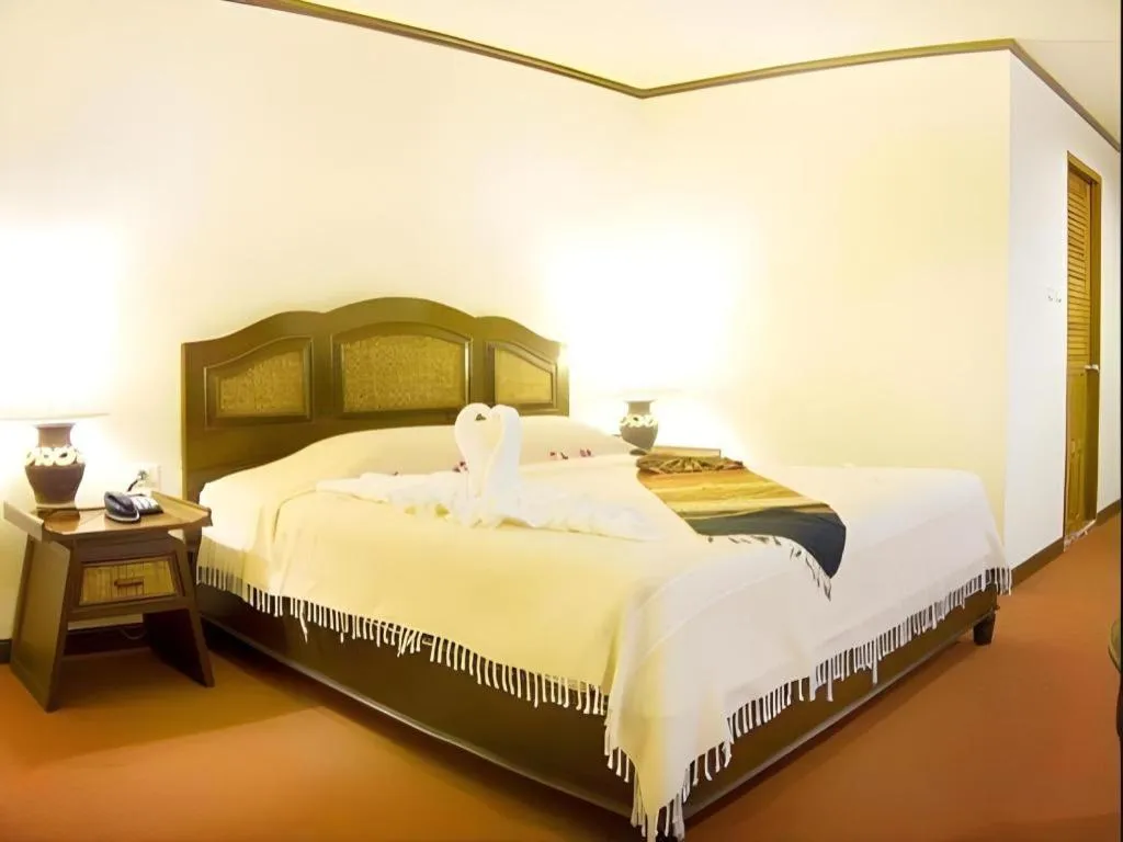 Bed in Phuphaya Resort Pattaya