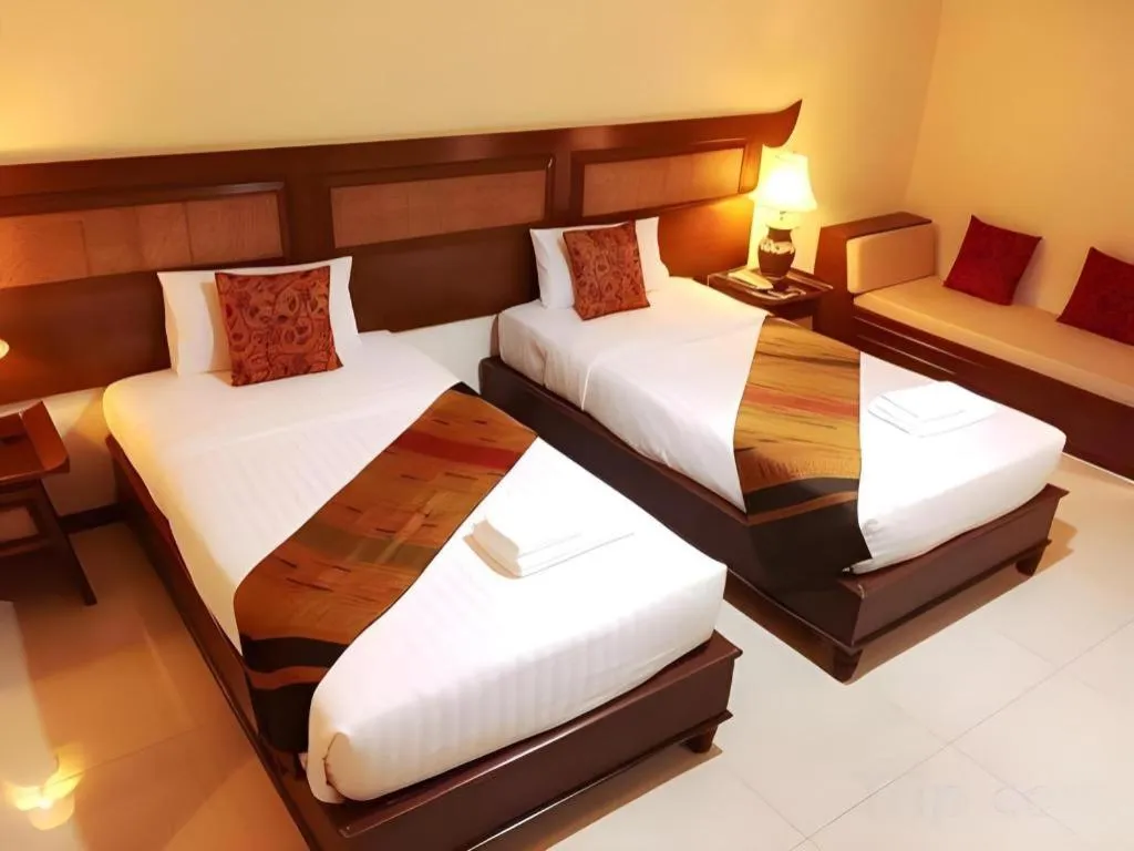 Bed in Phuphaya Resort Pattaya