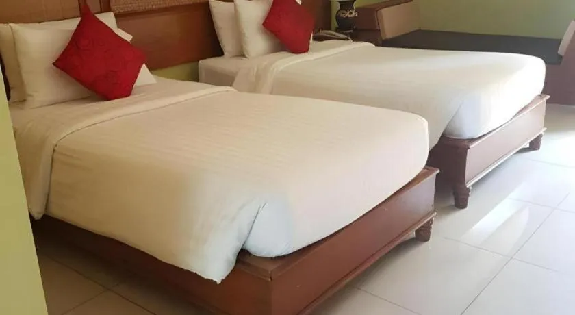 Bed in Phuphaya Resort Pattaya