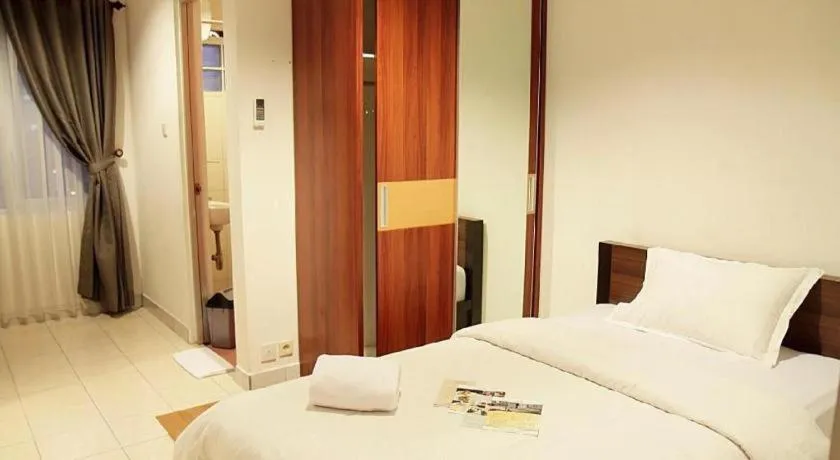 Bed in Lotus Bandung Hotel, Cafe, and Meeting Place