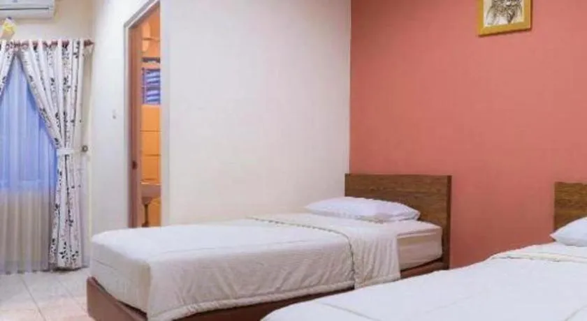 Bed in Lotus Bandung Hotel, Cafe, and Meeting Place