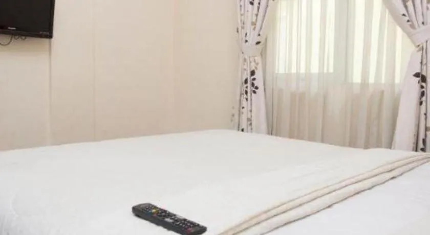 Bed in Lotus Bandung Hotel, Cafe, and Meeting Place