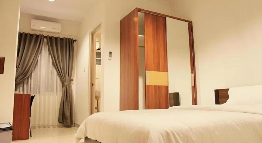 Bed in Lotus Bandung Hotel, Cafe, and Meeting Place