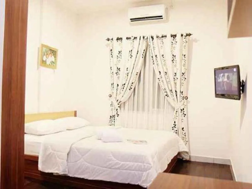 Bed in Lotus Bandung Hotel, Cafe, and Meeting Place