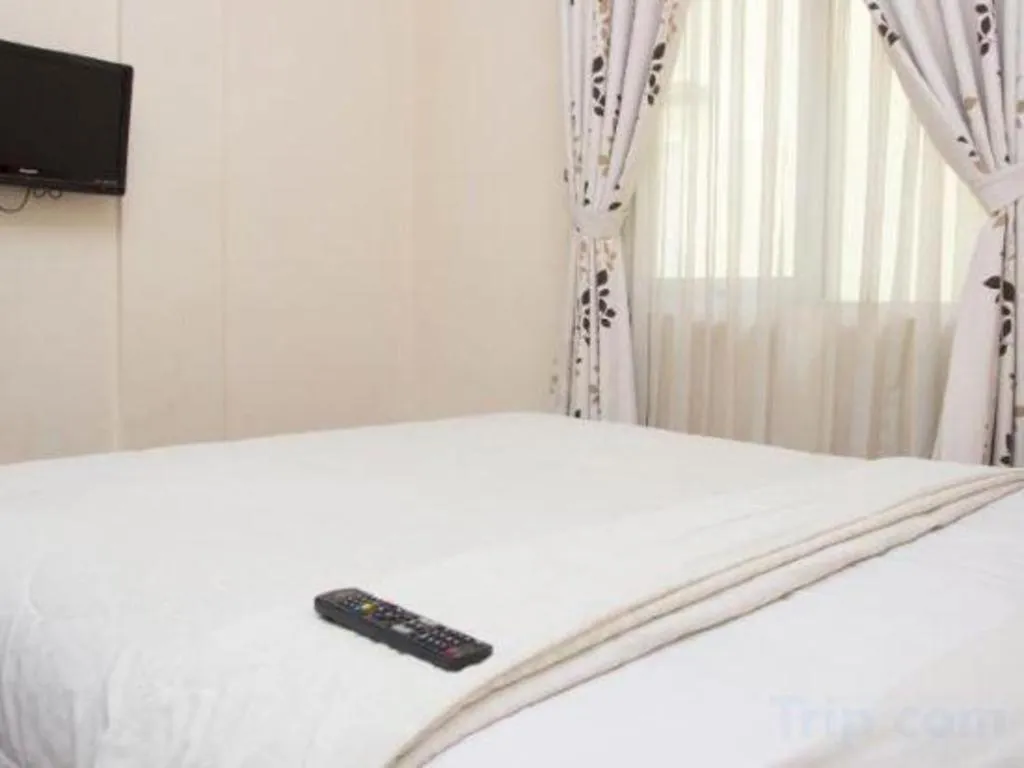 Bed in Lotus Bandung Hotel, Cafe, and Meeting Place