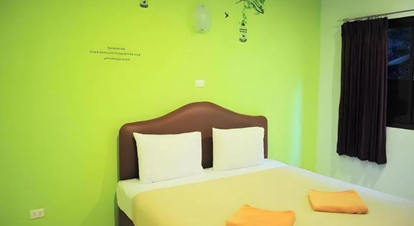 Bed in Baan Suan Sook Resort