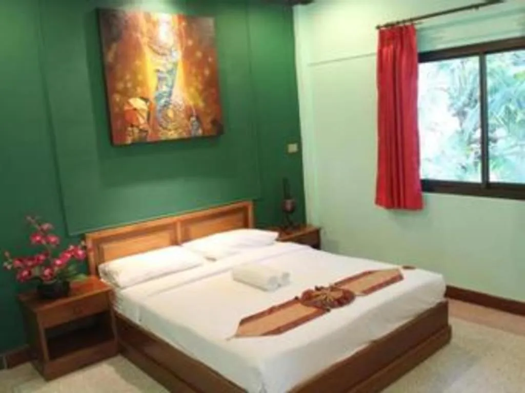 Bed in Baan Suan Sook Resort