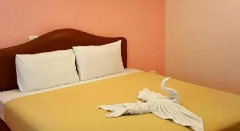 Bed in Baan Suan Sook Resort