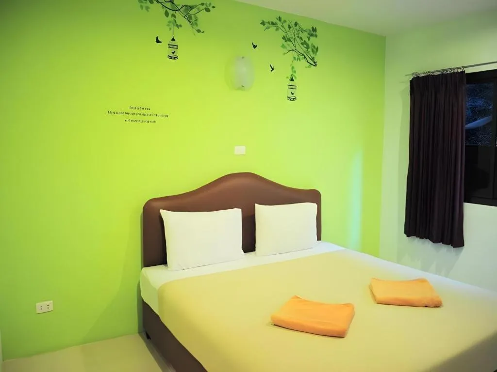 Bed in Baan Suan Sook Resort