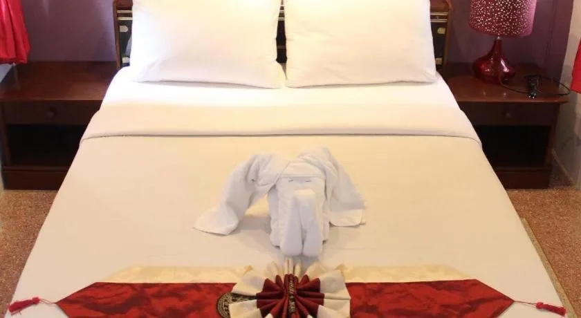 Bed in Baan Suan Sook Resort