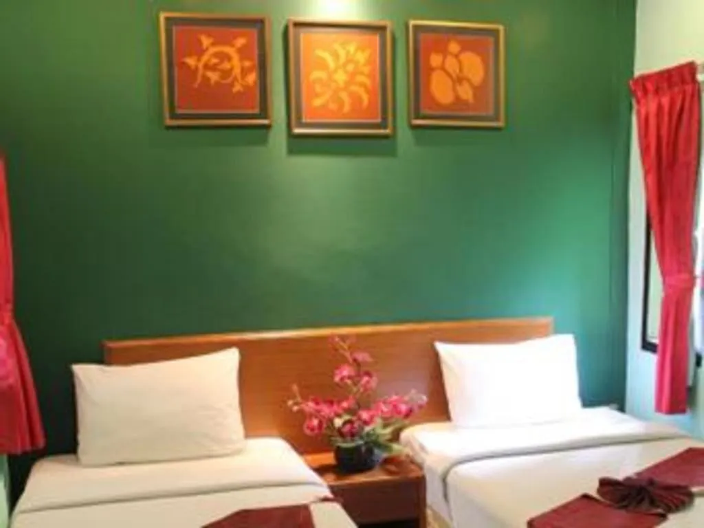 Bed in Baan Suan Sook Resort