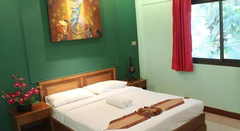 Bed in Baan Suan Sook Resort