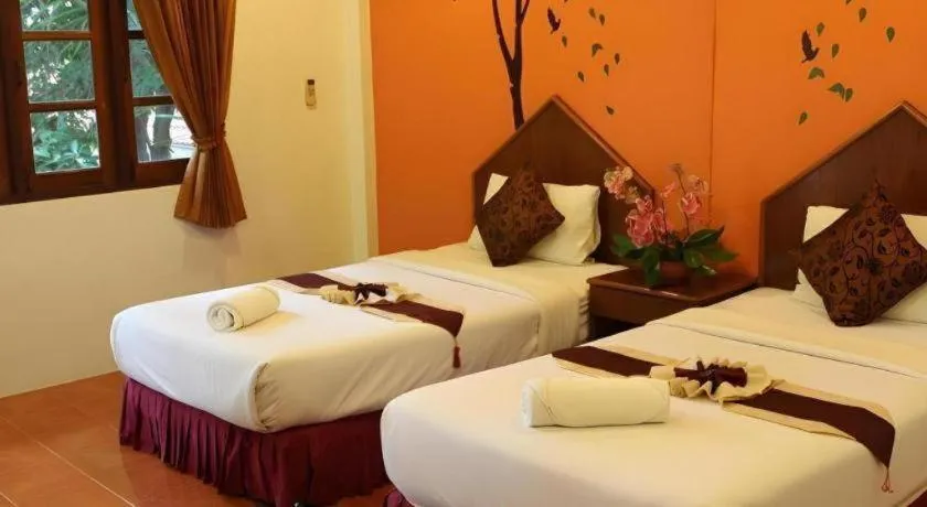 Bed in Baan Suan Sook Resort