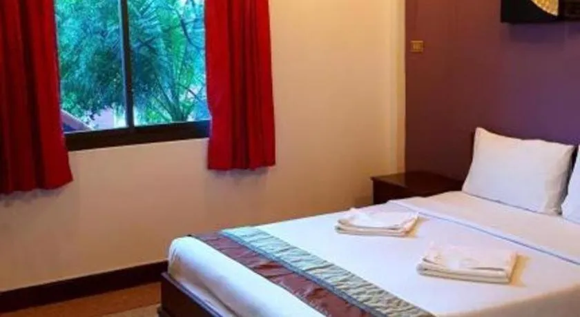 Bed in Baan Suan Sook Resort