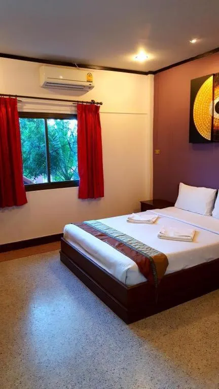 Bed in Baan Suan Sook Resort