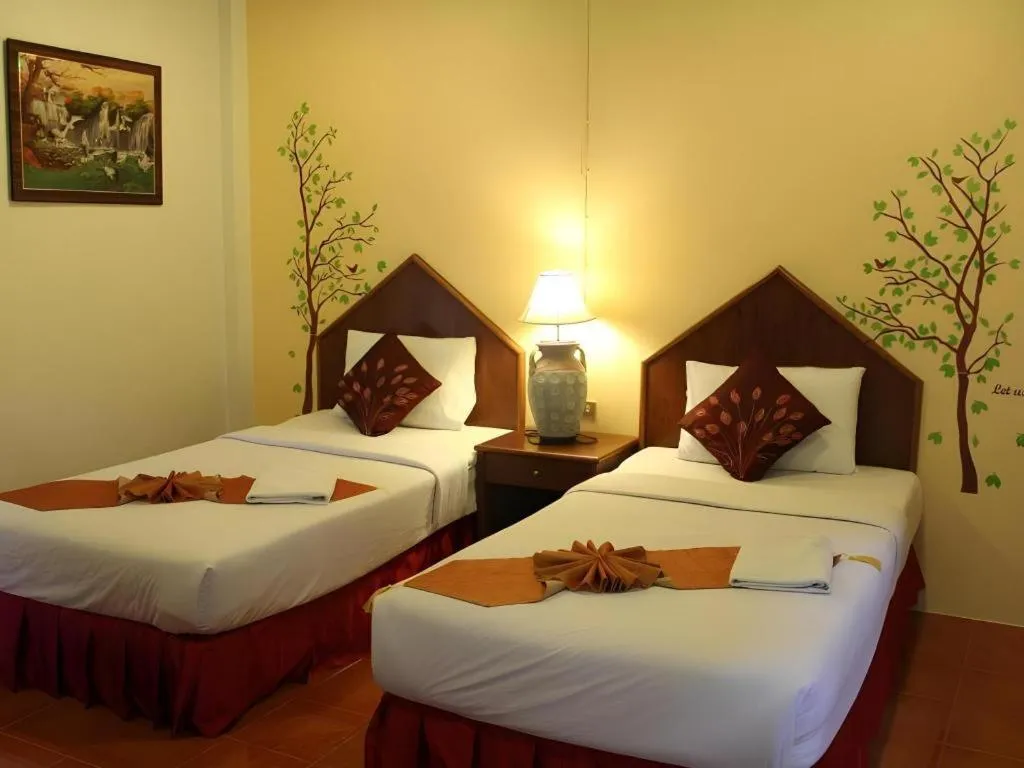 Bed in Baan Suan Sook Resort