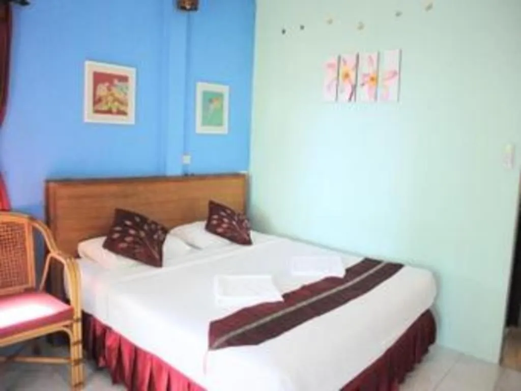 Bed in Baan Suan Sook Resort