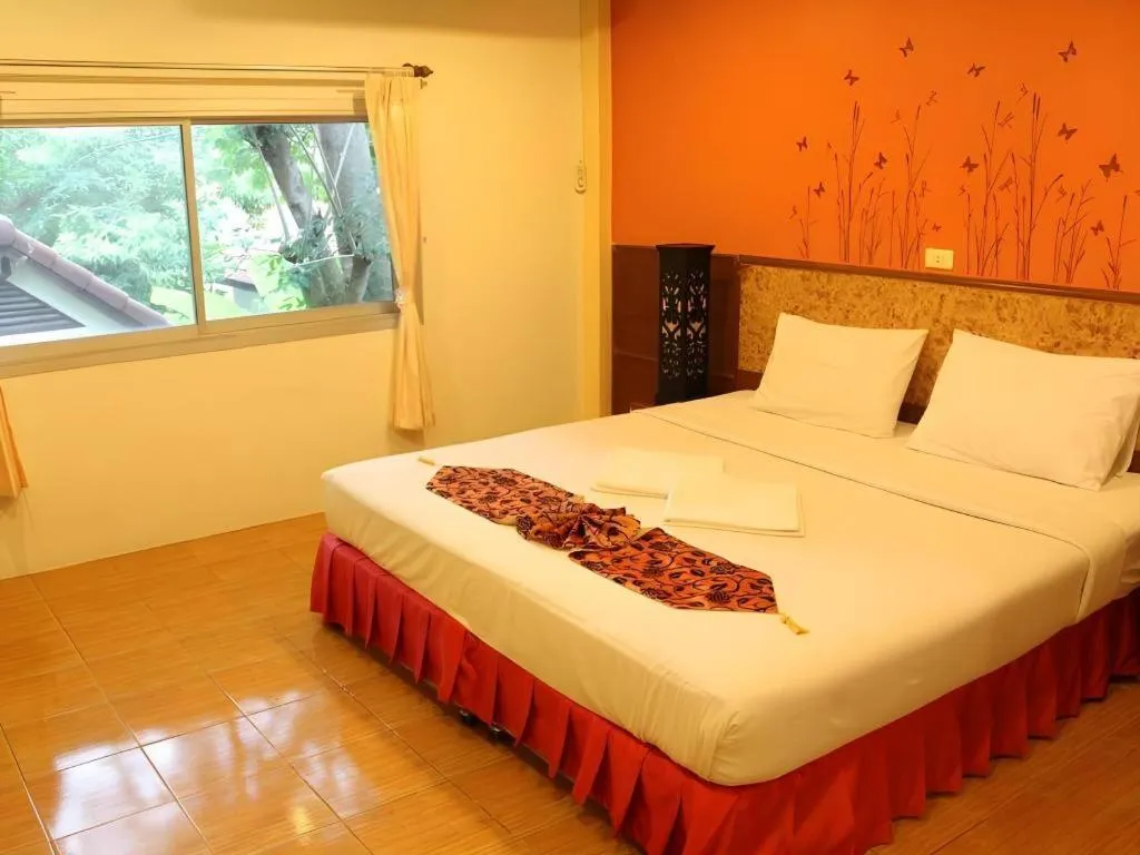 Bed in Baan Suan Sook Resort