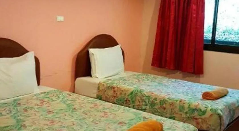 Bed in Baan Suan Sook Resort