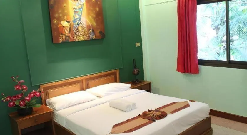 Bed in Baan Suan Sook Resort