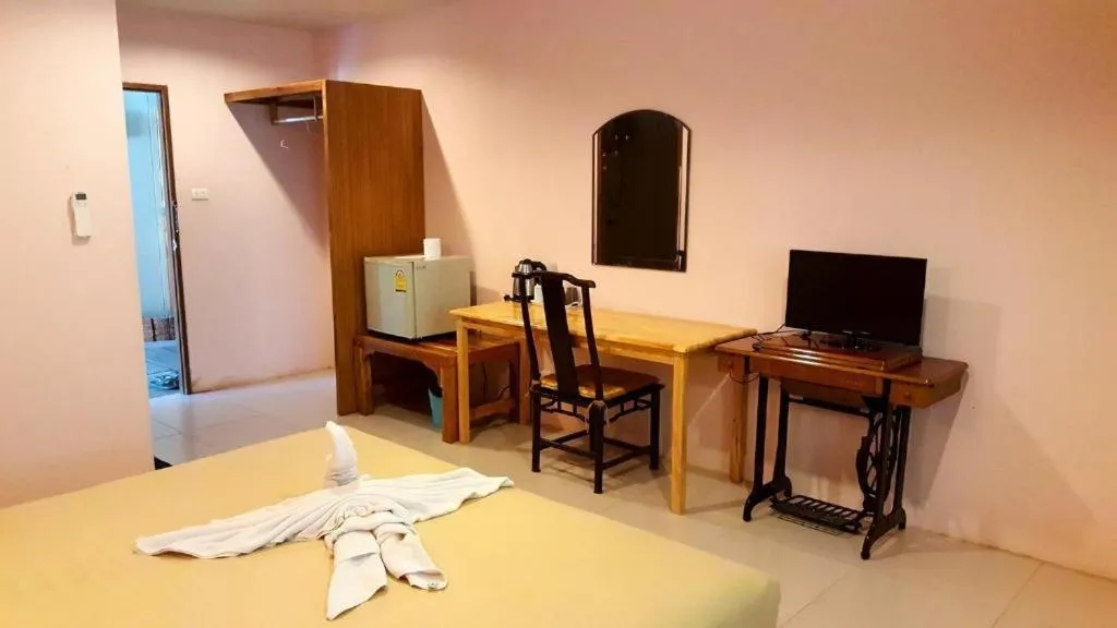 Bed in Baan Suan Sook Resort