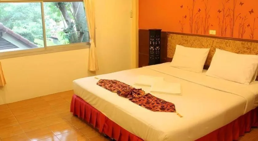 Bed in Baan Suan Sook Resort