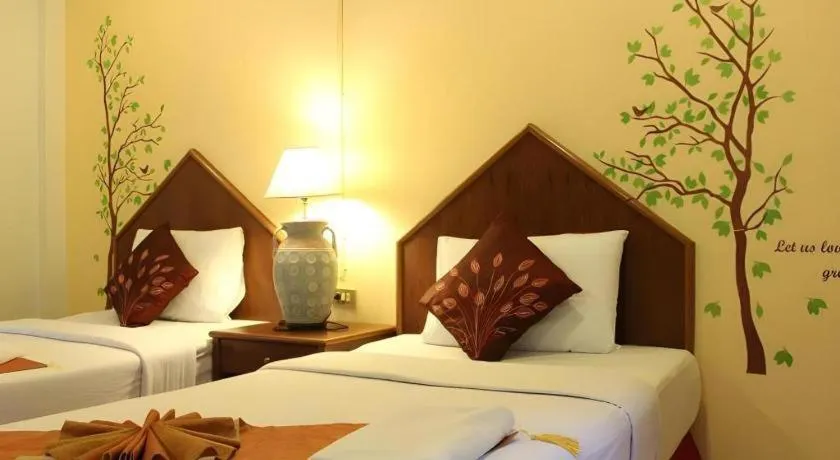 Bed in Baan Suan Sook Resort