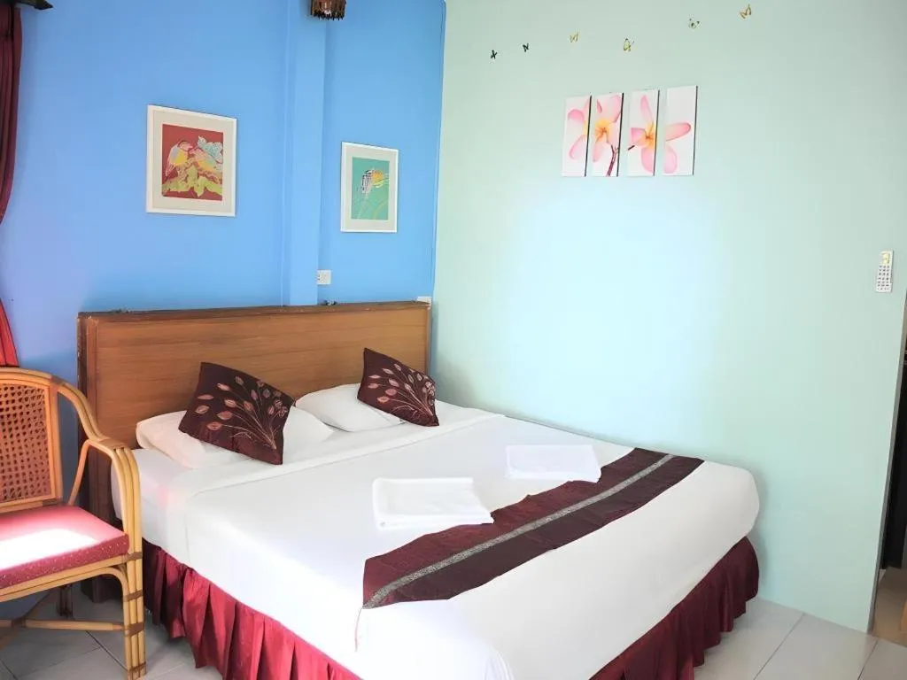 Bed in Baan Suan Sook Resort