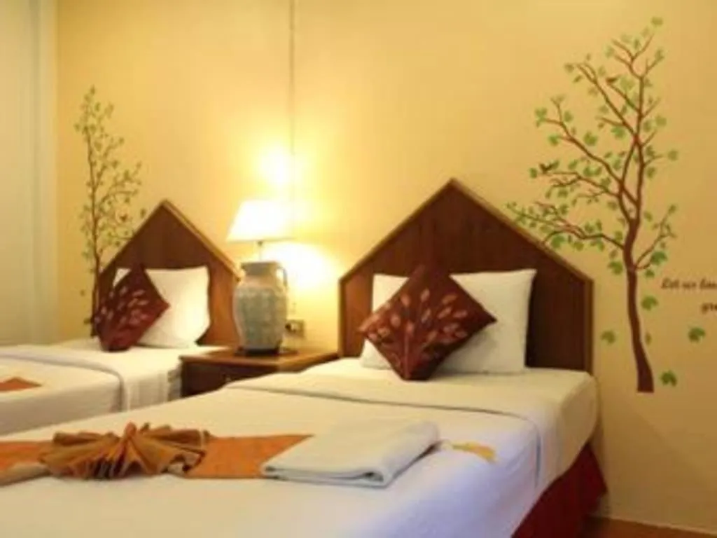 Bed in Baan Suan Sook Resort