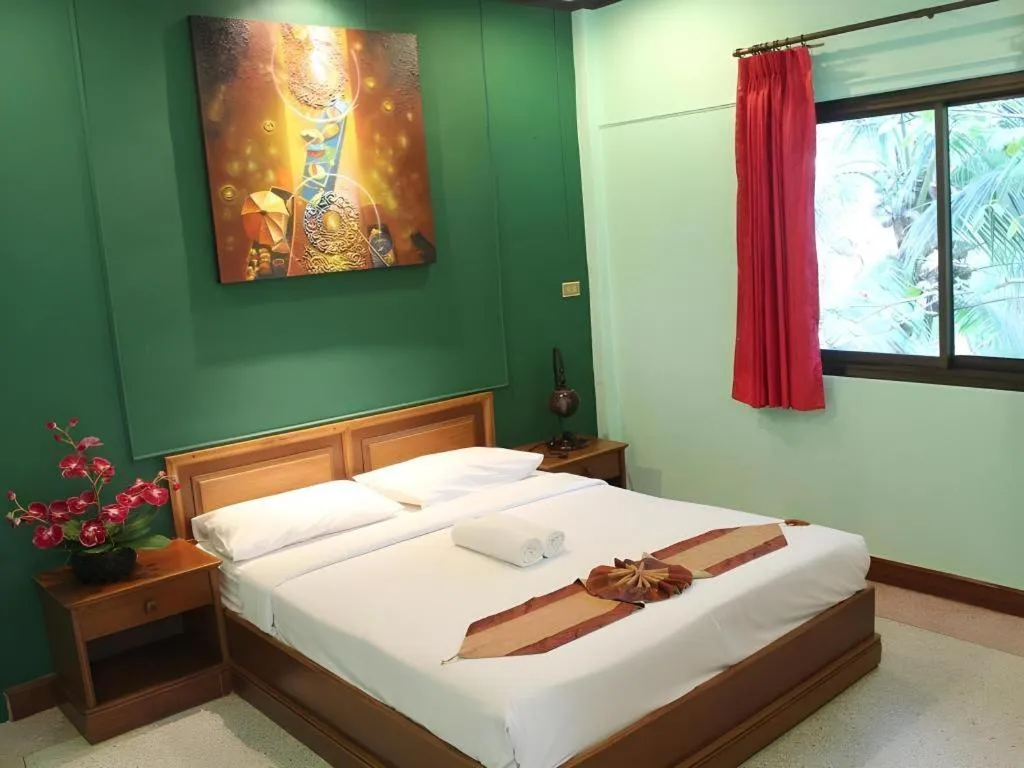 Bed in Baan Suan Sook Resort