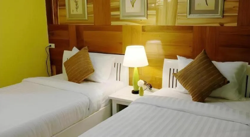 Bed in Ladawan Boutique Hotel