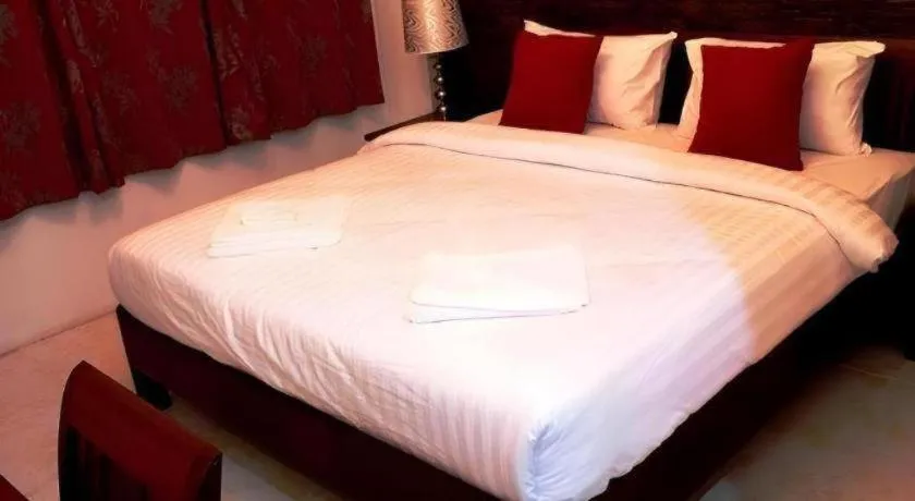 Bed in Ladawan Boutique Hotel